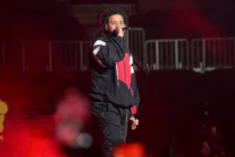 J. Cole performs onstage during Lil Baby & Friends Birthday Celebration